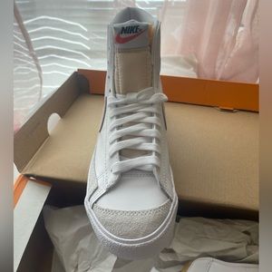 Brand new Nike blazers. NEVER WORN.